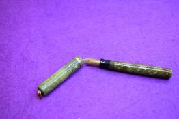 A Sheaffer Lifetime leverfill fountain pen in jade green with single band and ring to cap and