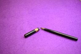 A Mabie Todd & co Swan No2 Eyedropper fountain pen in chased BHR, screw cap with broad band, with