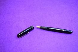 A Mabie Todd & Co Swan 3160 Self filler leverfill in black, single band to cap, with Swan No1 nib.