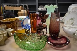 A varied collection of art glass including unusual vase with fluted edge.
