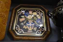 A framed wool work style tapestry