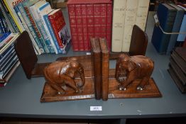 Wooden Bookends. One having adjustable sliding shelf, the other having an Elephant design. (2)