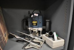 A woodworkers Power Craft pbf 1200 router and accessories