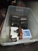 A box of vintage glass plates/slides including word interest and travel also woodland and religion.