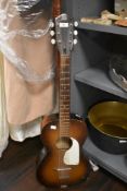 A small sized acoustic guitar by Framus Werke