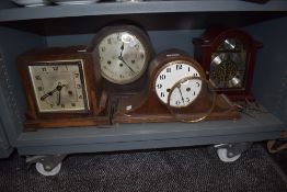 A selection of mantle clocks including Napoleon and bracket design