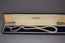 A string of graduated cultured pearls with tongue and box clasp, approx 16