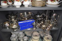 A selection of silver plated serving wares including dishes and tea service