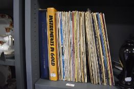 A selection of vinyl albums including Ellie Holcombe