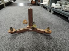 An arts and crafts style light fitment in sapele wood