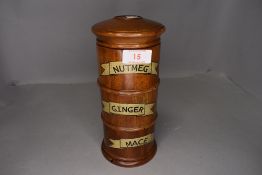 A modern reproduction kitchen spice tower