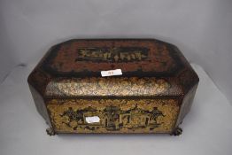 An antique Japan lacquer trinket or sewing case highly decorated with fantasy scenes