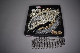 A small selection of costume jewellery including diamante necklaces and earrings etc