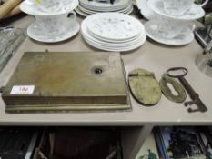 A large antique brass lock, with escutcheon plates and key.
