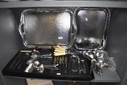 A selection of loose and cased cutlery and flatware with two serving trays