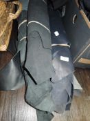 A selection of leather or leatherette style haberdashery fabric rolls