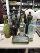 A collection of vintage and antique bottles of mixed interest including Kendal, Kirkby Stephen,