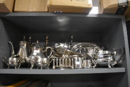 A selection of silver plated serving dishes and tea service