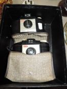Two Kodak Brownie 127 cameras.