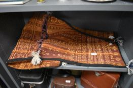 A traditional double sided camel or horse salt or similar bag being hand dyed and woven