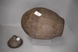 An ethnic tribal container possibly African with woven fibre and lacquer case
