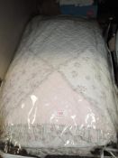 Two vintage style bed throws.