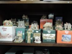 A selection of Lilliput lane model houses and cottages most being boxed