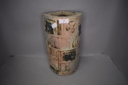 A modern studio pottery vase in a Troika style by John Davenport