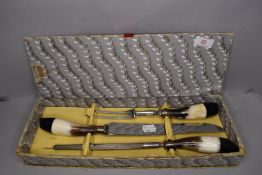 A horn handled carving or server set by Baxtor