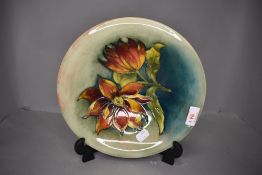 A Moorcroft bowl stamped and signed to base in a crocus style design AF