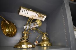 A pair of adjustable brass cased library or office desk top lamps