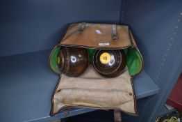 A set of four antique wooden crown green bowls in case