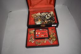 A jewellery box and contents including rings, watches etc