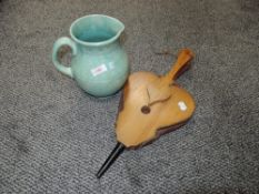A pair of fire side bellows and an art deco water jug by Arthur Wood