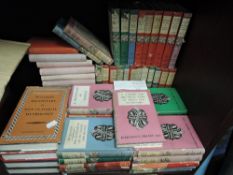 A selection of library books and volumes including Dent Dutton