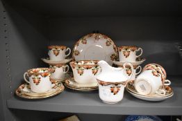 A part tea service in an imari design by The Rock Pottery co
