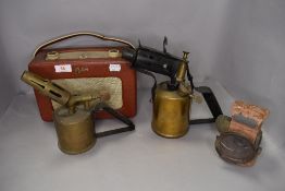 A selection of hardware including blow torches an Roberts radio