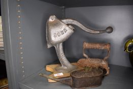 A selection of hardware including oil can and Bona fruit press