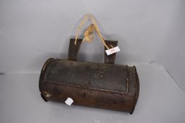 A vintage tin candle box