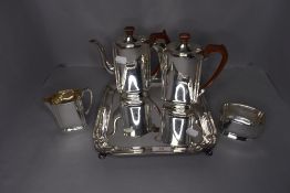 A fine bachelors tea set for one in an art deco design having bakelite handles