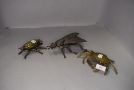 Three figural ashtrays in the form of insects including brass beetle, fly and a crab