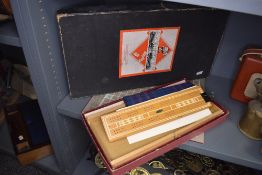 Two vintage board games including Monopoly and Scrabble