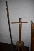 A vintage early 20th century dolly peg and a Swiftsure copper posser
