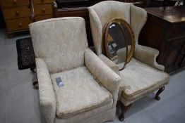 Two easy chairs including Queen Anne style wingback