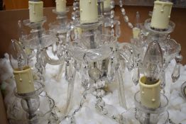 A vintage glass ceiling chandelier of traditional lustre drop design