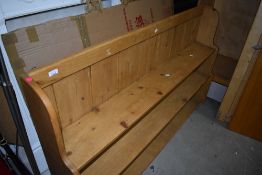 A natural pine waterfall style bookshelf, width approx. 152cm