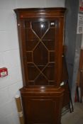 A late C20th reproduction full height corner display cabinet