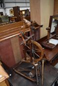 A vintage refurbished spinning wheel of Castle design