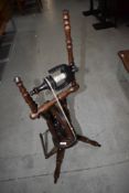 A reproduction stained frame spinning wheel, of Castle style