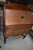 An Edwardian mahogany and inlaid bureau